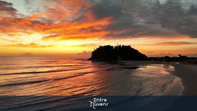 amanhecer em guaratuba - reflexo morro do cristo